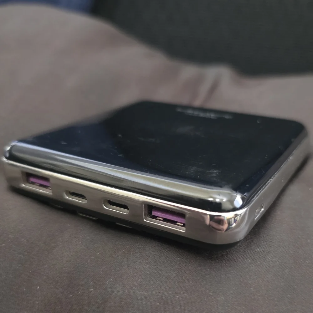 Adaptive Quick Charging Power Bank w/ Integrated Cabels